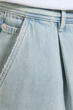 Loose jeans met plooien