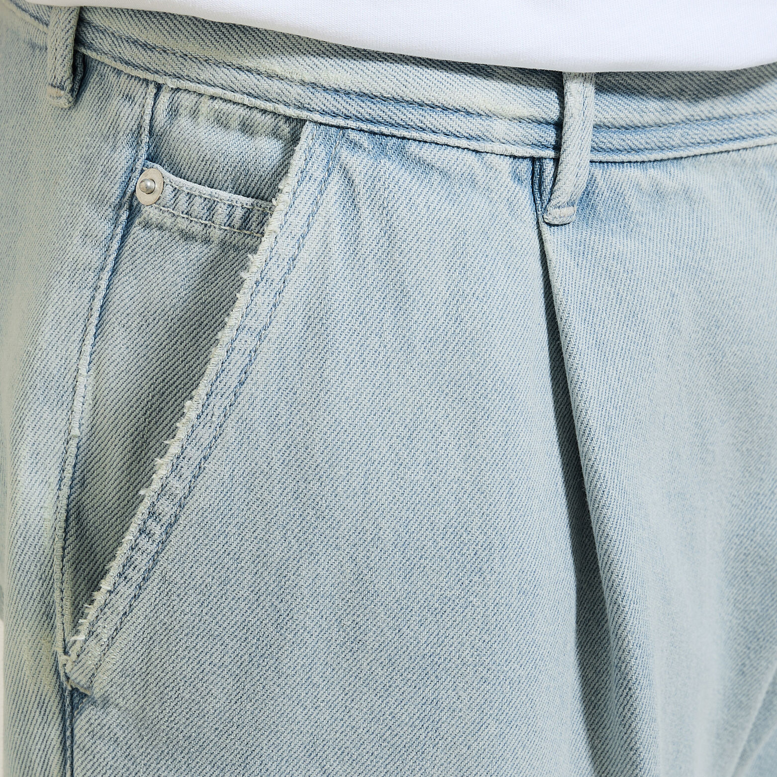 Loose jeans met plooien